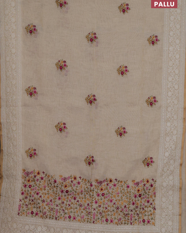 Linen cotton saree cream with embroidery buttas and embroidery pallu
