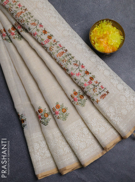 Linen cotton saree cream with embroidery buttas and embroidery pallu