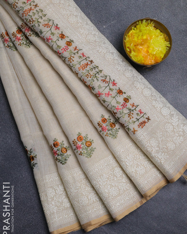 Linen cotton saree cream with embroidery buttas and embroidery pallu