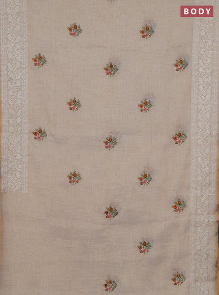 Linen cotton saree cream with embroidery buttas and embroidery pallu