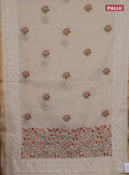 Linen cotton saree cream with embroidery buttas and embroidery pallu