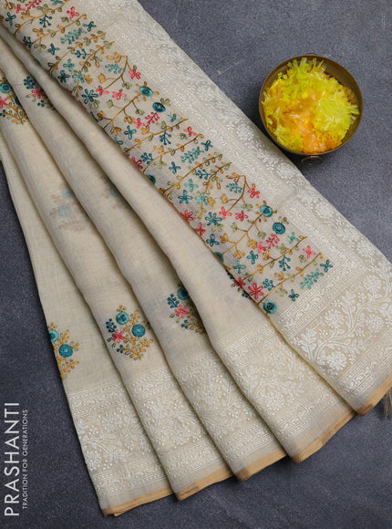 Linen cotton saree cream with embroidery buttas and embroidery pallu