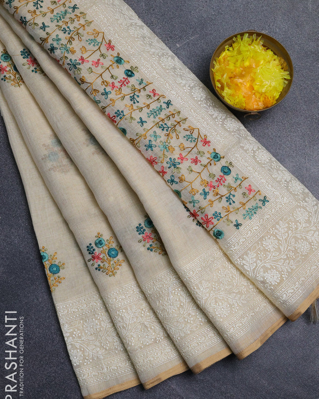 Linen cotton saree cream with embroidery buttas and embroidery pallu