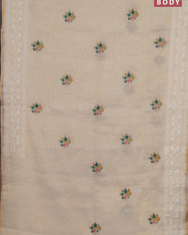 Linen cotton saree cream with embroidery buttas and embroidery pallu