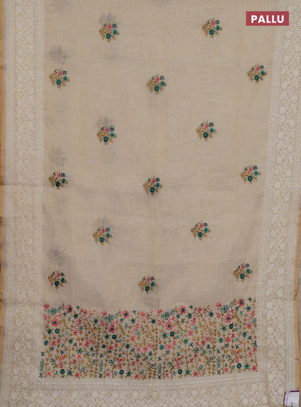 Linen cotton saree cream with embroidery buttas and embroidery pallu