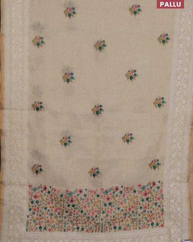 Linen cotton saree cream with embroidery buttas and embroidery pallu