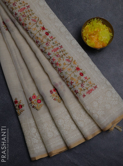 Linen cotton saree cream with embroidery buttas and embroidery pallu