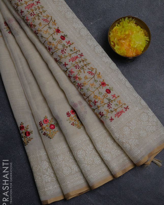 Linen cotton saree cream with embroidery buttas and embroidery pallu