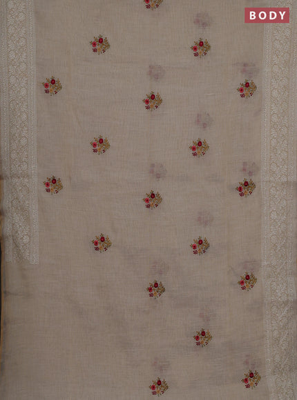 Linen cotton saree cream with embroidery buttas and embroidery pallu