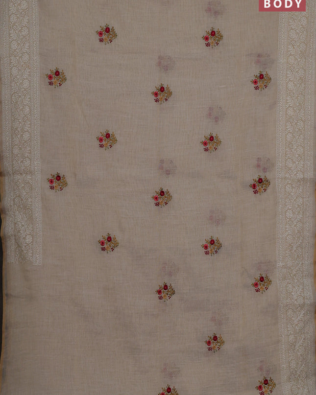 Linen cotton saree cream with embroidery buttas and embroidery pallu