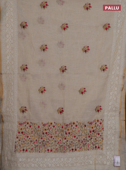 Linen cotton saree cream with embroidery buttas and embroidery pallu