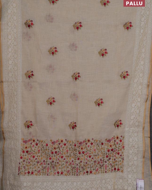 Linen cotton saree cream with embroidery buttas and embroidery pallu