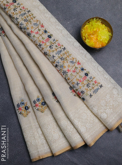 Linen cotton saree cream with embroidery buttas and embroidery pallu
