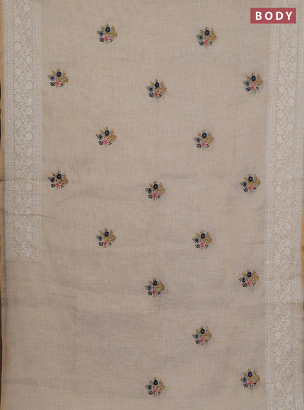 Linen cotton saree cream with embroidery buttas and embroidery pallu