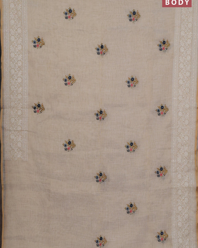 Linen cotton saree cream with embroidery buttas and embroidery pallu