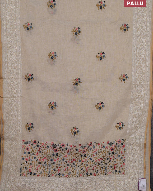 Linen cotton saree cream with embroidery buttas and embroidery pallu