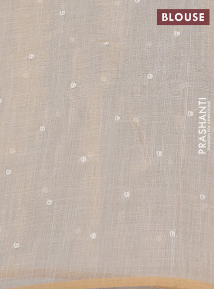 Linen cotton saree cream with embroidery buttas and embroidery pallu