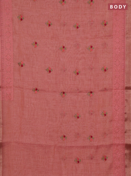Linen cotton saree peach shade with embroidery buttas and embroidery pallu