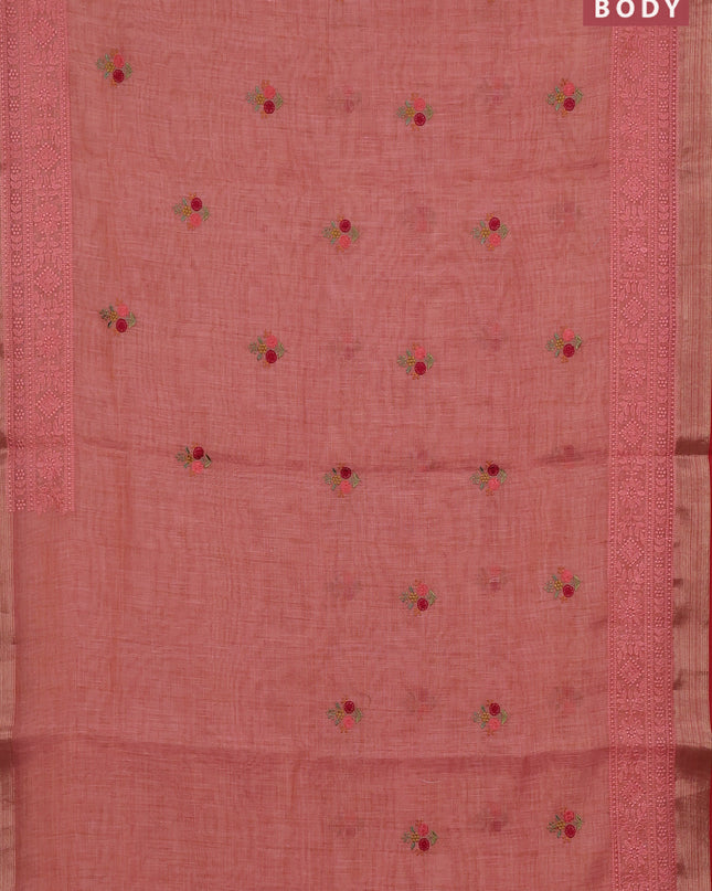 Linen cotton saree peach shade with embroidery buttas and embroidery pallu