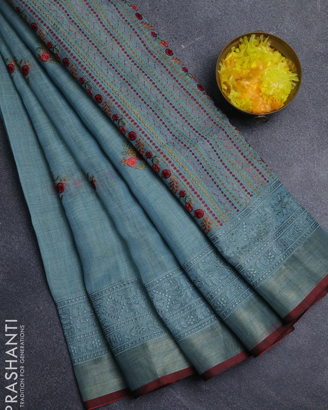 Linen cotton saree teal shade with embroidery buttas and embroidery pallu