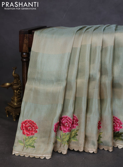Banarasi silk saree pastel green with allover zari weaves and floral design embroidery border