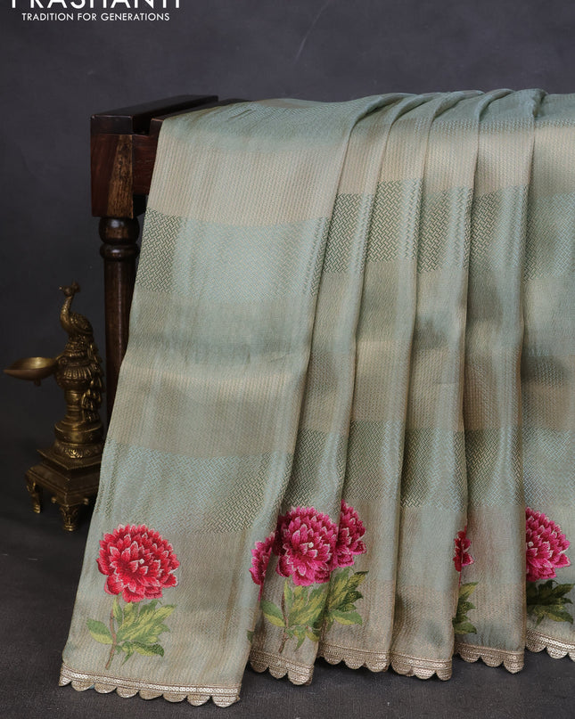 Banarasi silk saree pastel green with allover zari weaves and floral design embroidery border