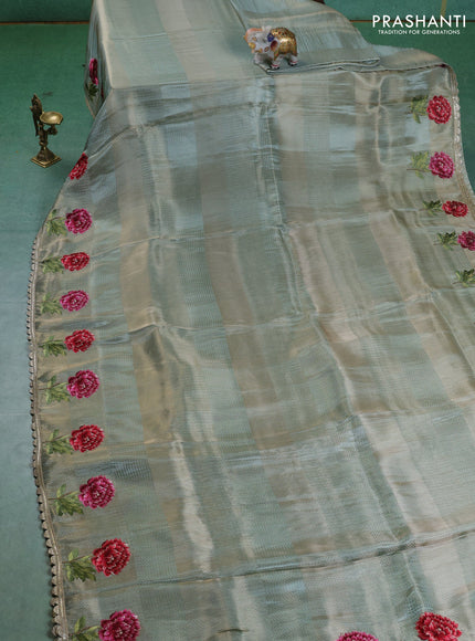 Banarasi silk saree pastel green with allover zari weaves and floral design embroidery border