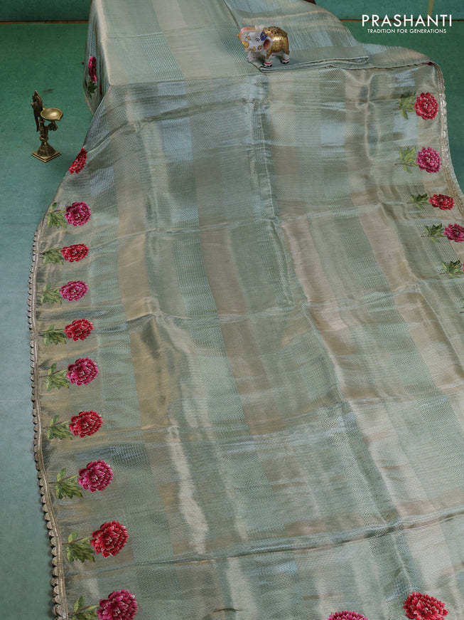 Banarasi silk saree pastel green with allover zari weaves and floral design embroidery border