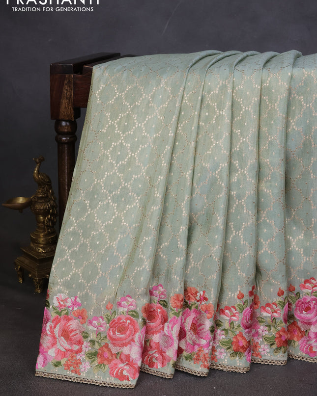 Banarasi silk saree pastel green with allover geometric zari weaves and floral design embroidery border