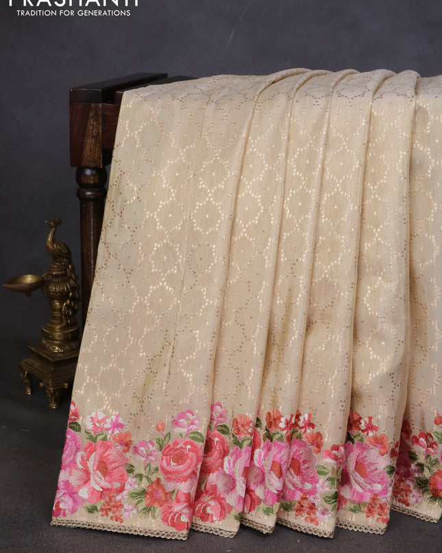 Banarasi silk saree beige with allover geometric zari weaves and floral design embroidery border