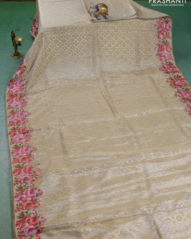 Banarasi silk saree beige with allover geometric zari weaves and floral design embroidery border