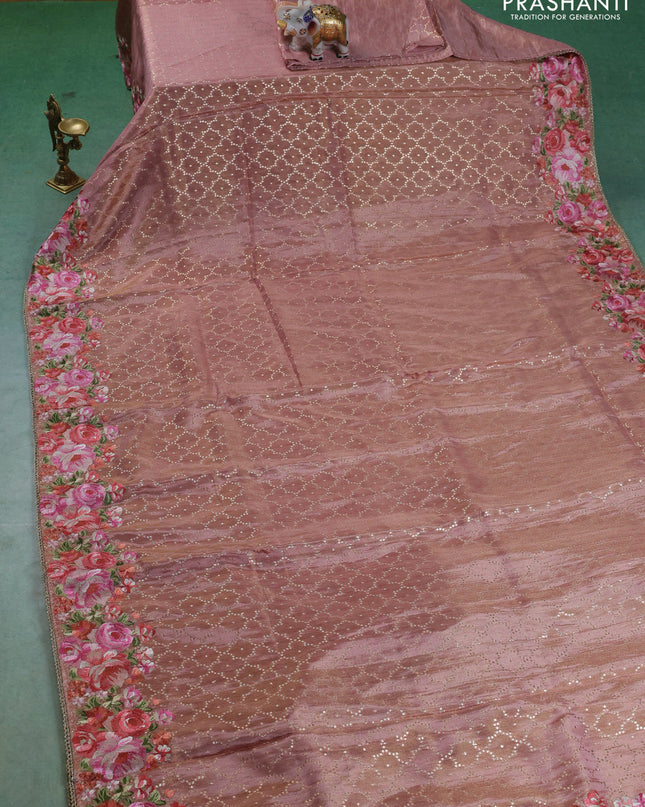 Banarasi silk saree peach shade with allover geometric zari weaves and floral design embroidery border
