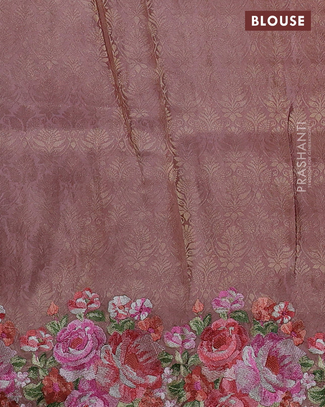 Banarasi silk saree peach shade with allover geometric zari weaves and floral design embroidery border