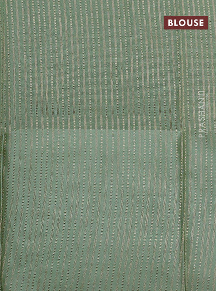 Kota silk saree pista green with zari woven buttas and self emboss border