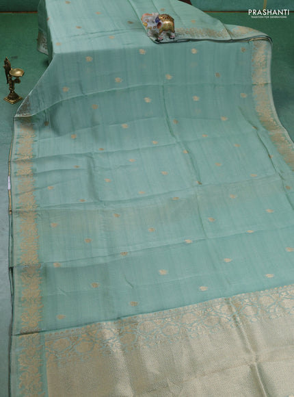 Kota silk saree pastel green with zari woven buttas and zari woven border