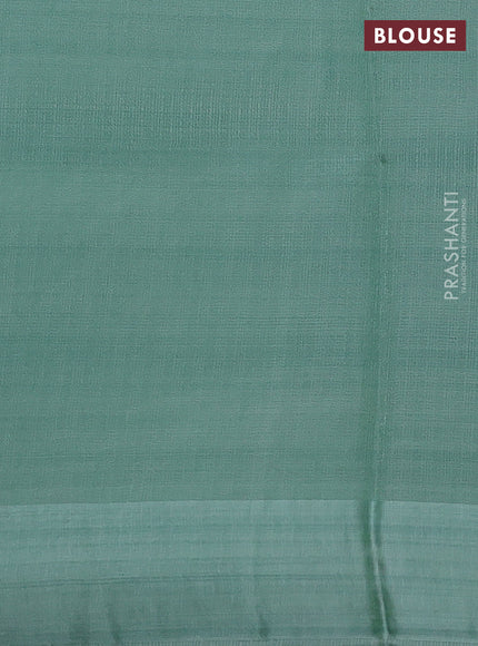 Kota silk saree pastel green with zari woven buttas and zari woven border