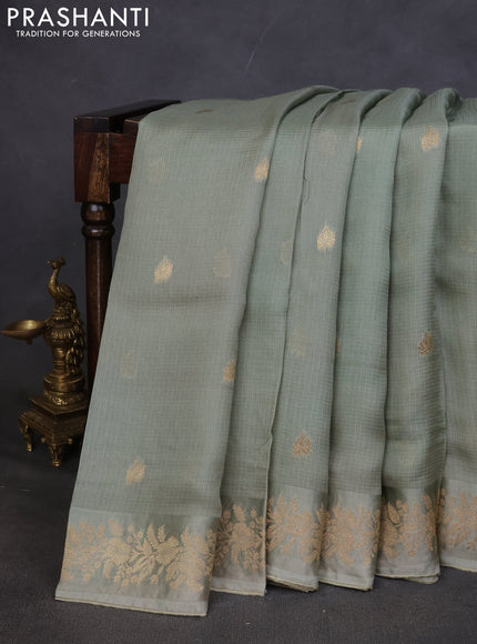 Kota silk saree pastel green with zari woven buttas and zari woven border