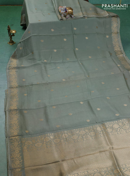 Kota silk saree pastel green with zari woven buttas and zari woven border