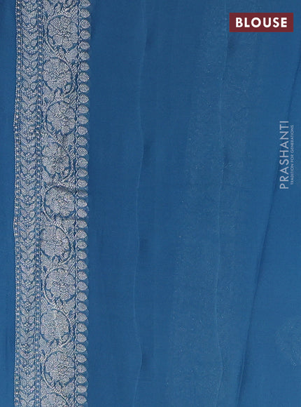 Pure banarasi chiffon saree blue shade with silver zari woven buttas and silver zari woven border