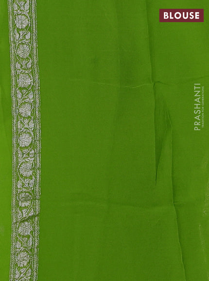 Pure banarasi chiffon saree fluorescent green with silver zari woven buttas and silver zari woven border