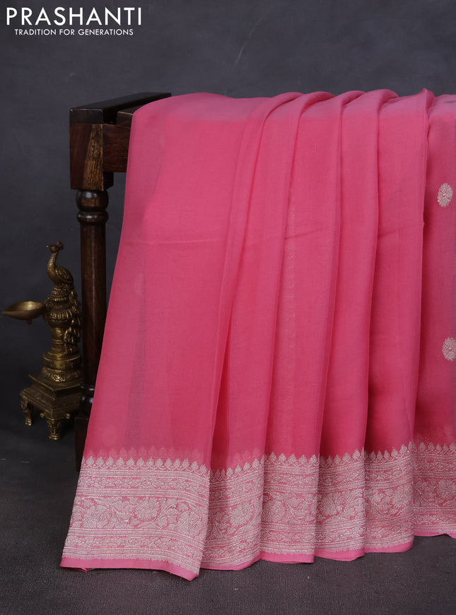 Pure banarasi chiffon saree peach pink with silver zari woven buttas and silver zari woven border
