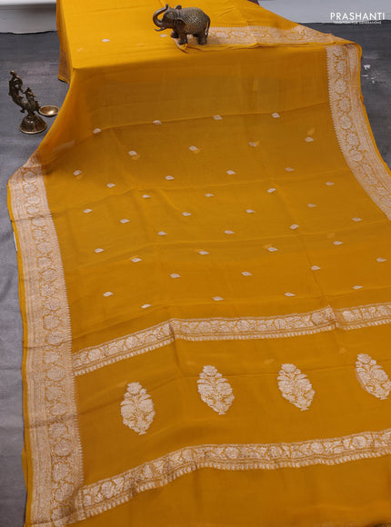 Pure banarasi chiffon saree mustard yellow with silver zari woven buttas and silver zari woven border