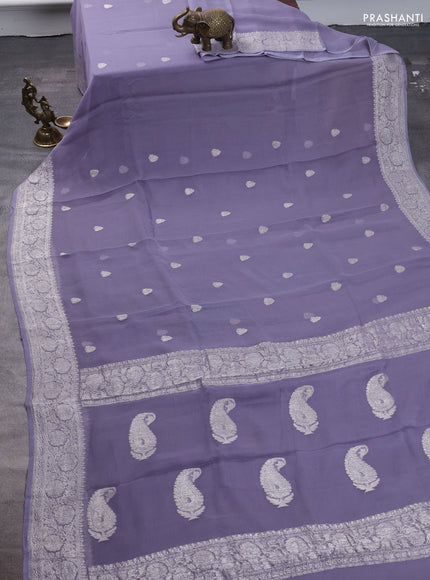 Pure banarasi chiffon saree pastel grey with silver zari woven buttas and silver zari woven border