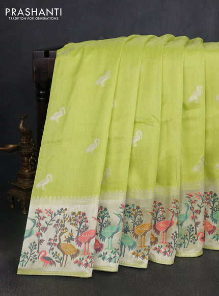 Banarasi semi raw silk saree fluorescent green with silver zari woven buttas and mina border