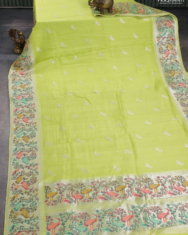 Banarasi semi raw silk saree fluorescent green with silver zari woven buttas and mina border