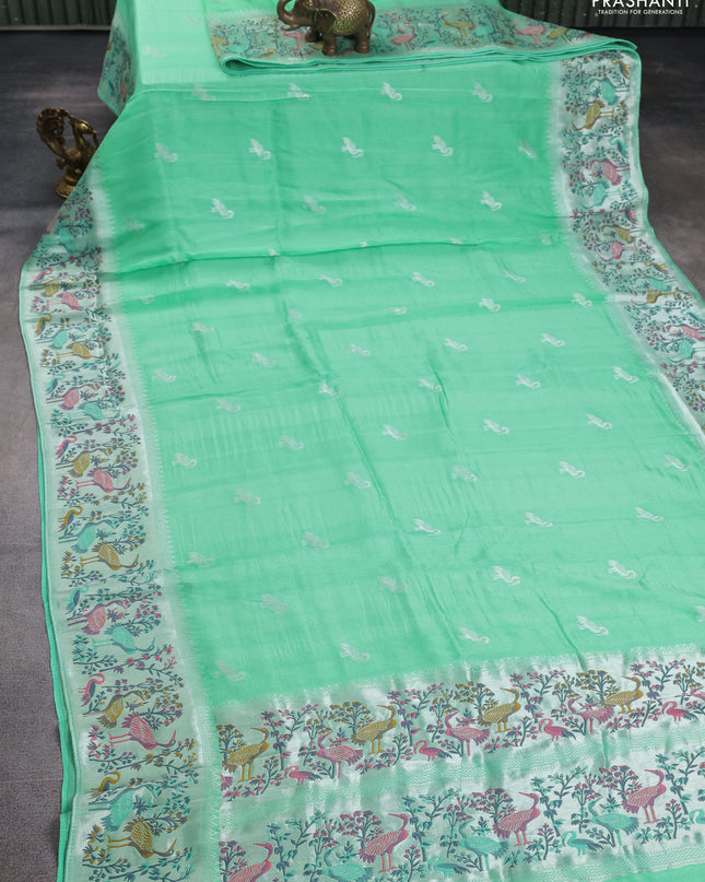 Banarasi semi raw silk saree teal green with silver zari woven buttas and mina border
