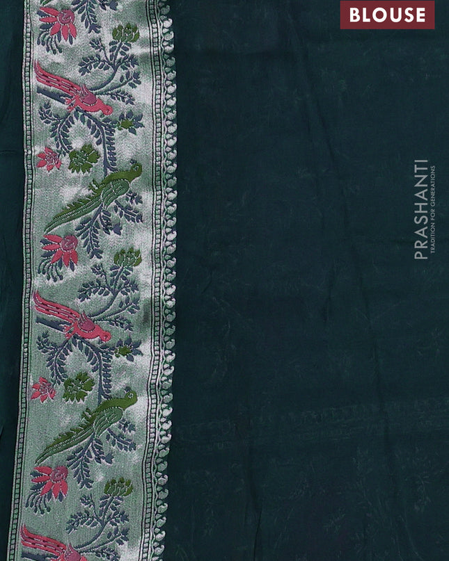 Banarasi semi raw silk saree peacock blue with silver zari woven coin buttas and mina border