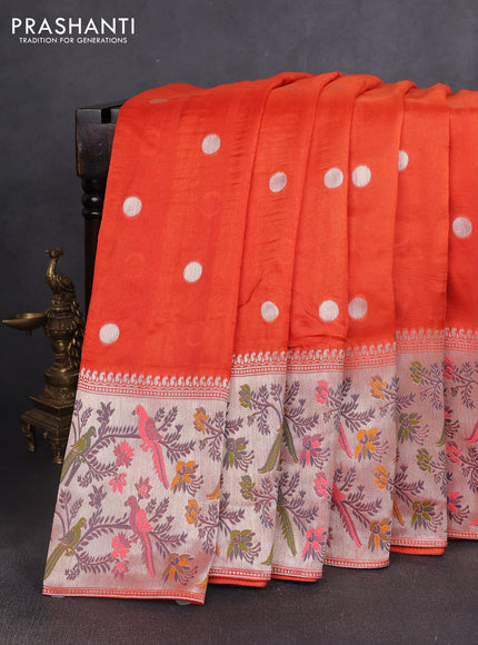Banarasi semi raw silk saree orange with silver zari woven coin buttas and mina border