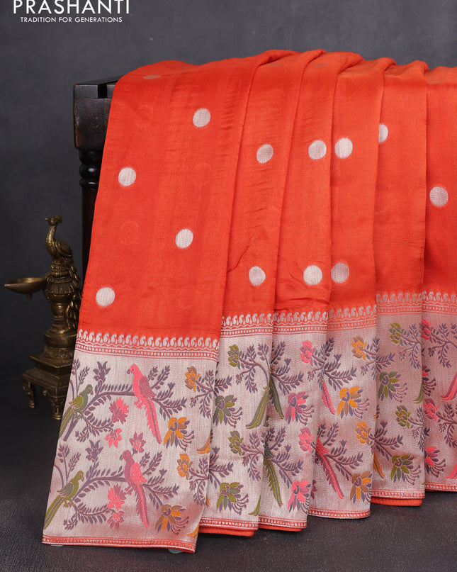 Banarasi semi raw silk saree orange with silver zari woven coin buttas and mina border