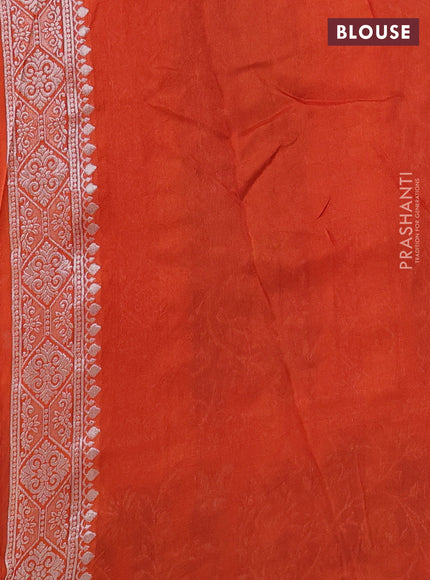 Banarasi semi raw silk saree orange with silver zari weaves and mina border